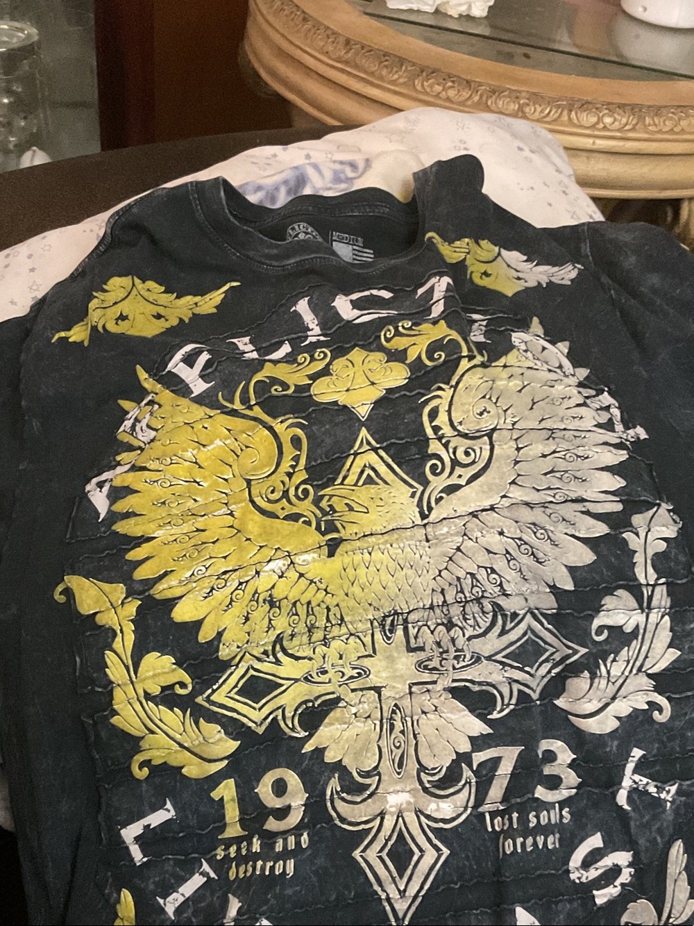 Affliction Black Short Sleeve Tee with Yellow and Cream Crest Graphic